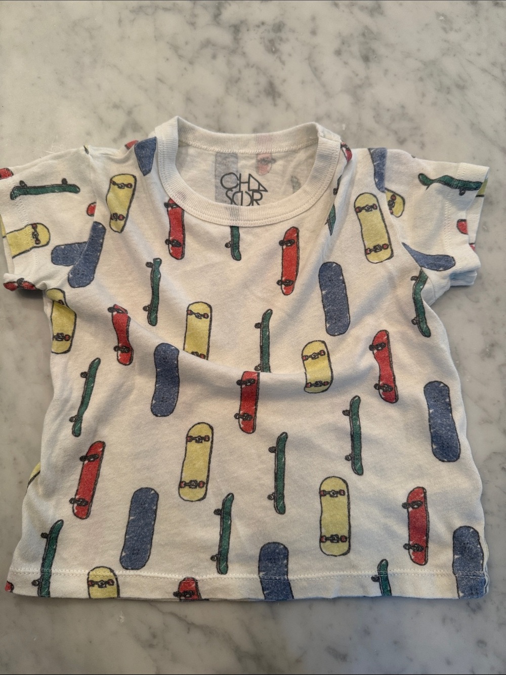 Chaser Kids White Tee with Red, Yellow, Blue & Green Skateboard Print